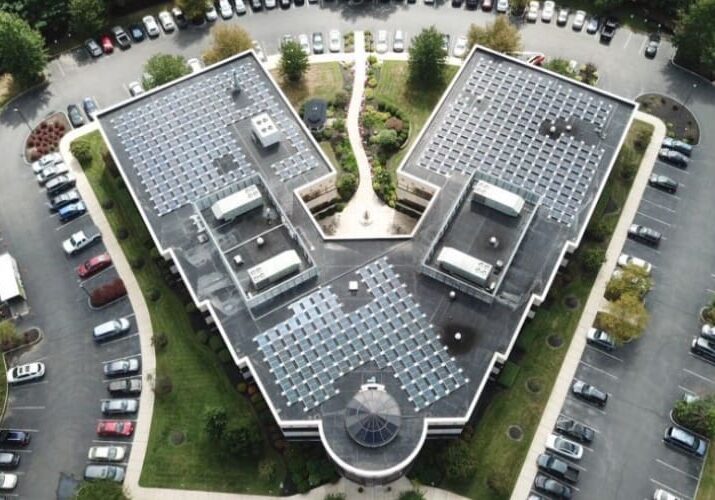 Moore Energy Aerial view of building with solar panels.